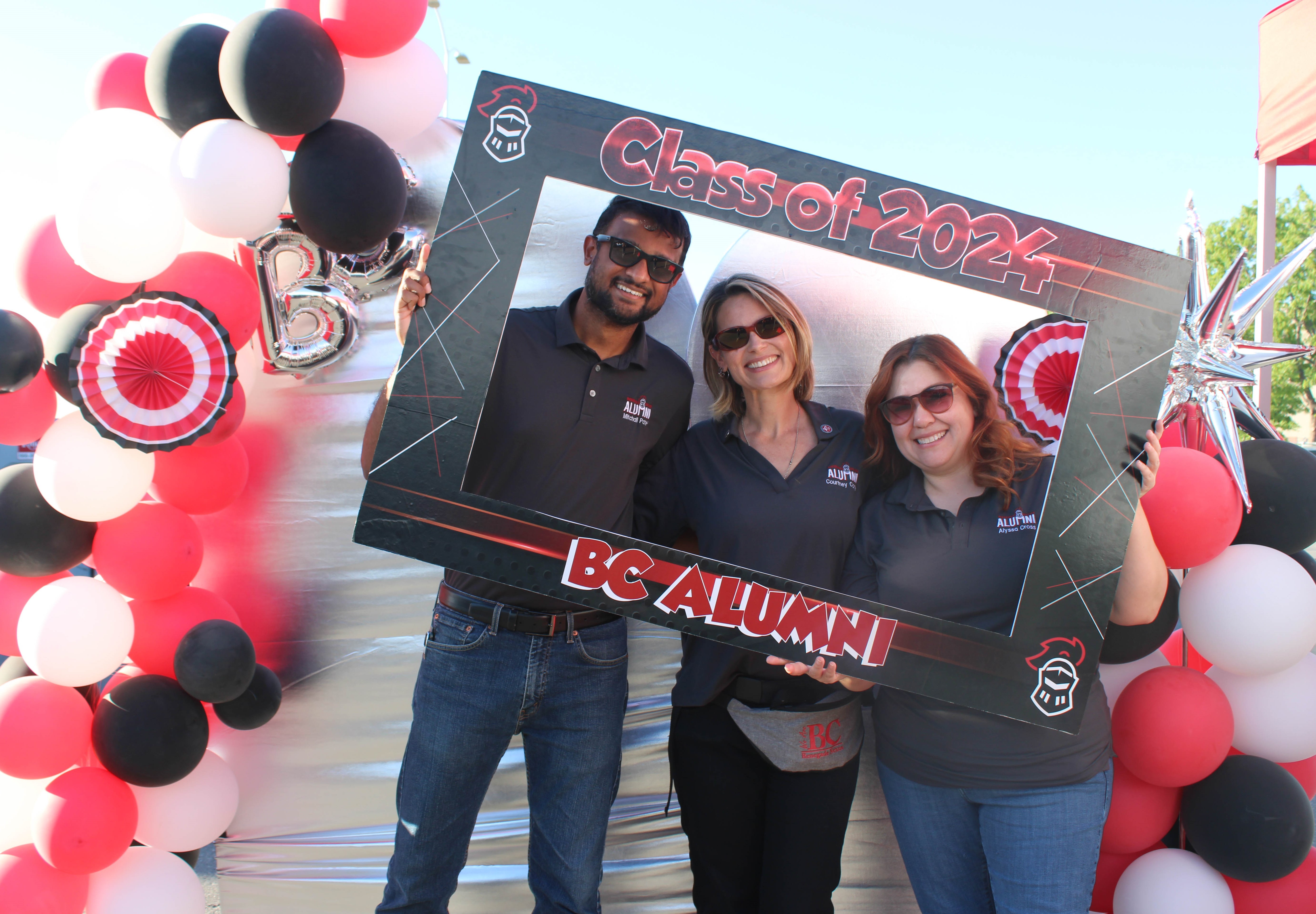 Mitchall Patel taking a photo with Foundation Staff at the 2024 BC Commencement