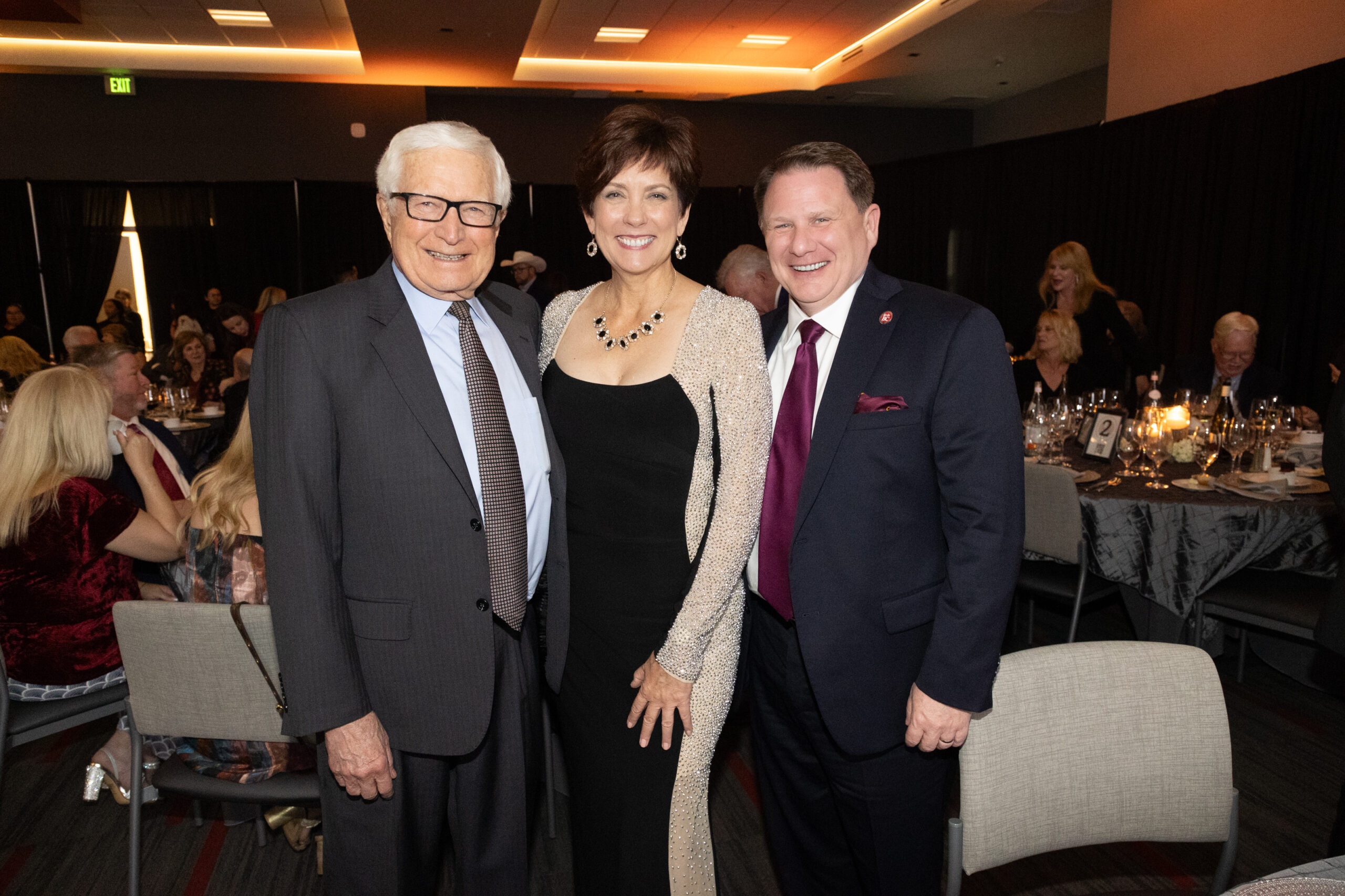 a group photo with honoree Dolores Salgado